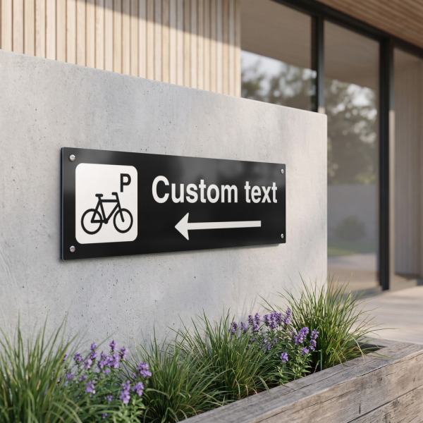 Cykelparkering skilt – sort henvisningsskilt med venstre pil og valgfri tekst, 150 x 500 mm 3 mm alu-sandwich